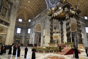 Pope Francis, background left, attends a prayer with Lebanon's Christian religious leaders in St. Peter's Basilica, at the Vatican, Thursday, July 1, 2021