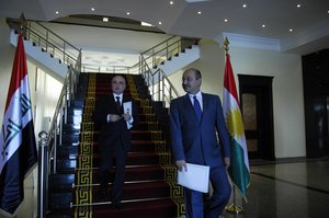 Kurdish President Masoud Barzani (R) meets Iraq's Deputy Prime Minister Barham Salih