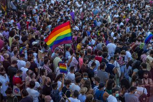 Demonstrators gather during a protest against the killing of Samuel Luiz in the Puerta del Sol in central Madrid, Spain, Monday, July 5, 2021.