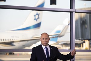 In this June 22, 2021 file photo, Israel's Prime Minister Naftali Bennett speaks to journalists after touring Ben Gurion Airport