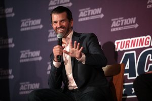 Donald Trump, Jr. speaking with attendees at the Four More Tour at the Crowne Plaza Phoenix Chandler Golf Resort in Chandler, Arizona