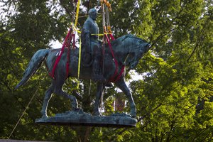 On July 10, 2021 the monument of Confederate General Robert E. Lee is lifted from its base in Market Street Park in Charlottesville, Virginia. The controversial Confederate monument stood in the park for over 100 years.