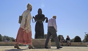 A bronze statue of Jesus Christ sits on display outside of the Prestonwood Baptist Church Sunday, Oct. 11, 2020, in Plano, Texas. Evangelical churches and their suburban members are a key to President Donald Trump's voter support in Texas