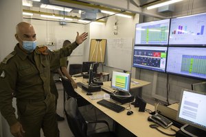 File - Maj. Gen. Ori Gordin, head of the Israeli army’s Home Front Command, gestures as he speaks at its headquarters, in Ramle, Central Israel, Tuesday, Aug. 25, 2020. Gordin is overseeing the military’s coronavirus “task force,” formed in August to bring one of the developed world’s worst outbreaks under control. Its main responsibility is taking the lead in contact tracing and breaking chains of infection.