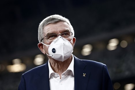 In this Nov. 17, 2020, file photo, IOC President Thomas Bach visits the National Stadium, the main venue for the 2020 Olympic and Paralympic Games postponed until July 2021 due to the coronavirus pandemic, in Tokyo.