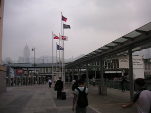 Five Flag Poles of the Wharf near Star Ferry Pier and Ocean Terminal. Five flags are of the Wharf, Harbour City, Cable TV, Wharf T&T and Star Ferry. Even today, the company is still the owner of the Star Ferry, although this icon of Hong Kong now forms a relatively small part of the company's portfolio