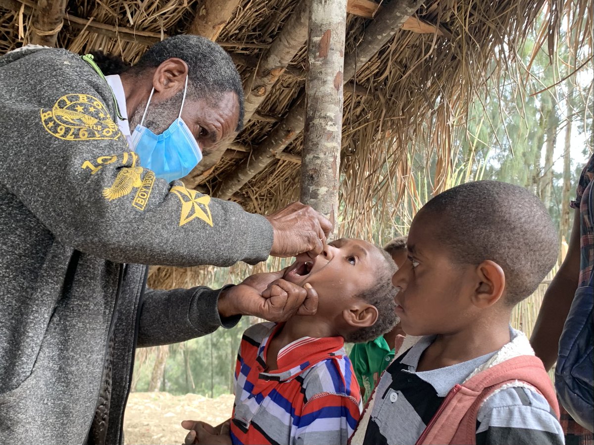 Health care workers vaccinate children under five years old for polio, administer vitamin A supplements and distribute deworming tables to implement the 2020 Papua New Guinea national supplementary immunization activities

