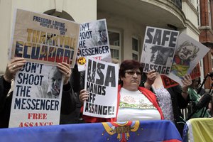 File - Supporters of Wikileaks founder Julian Assange demonstrate outside the Ecuadorian Embassy in London, Monday, 16 June, 2013. Assange was arrested in 2019 and has been incarcerated in HM Prison Belmarsh in London since then.