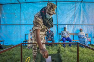 A member of Tigray Special Forces casts his vote in a local election in the regional capital Mekelle, in the Tigray region of Ethiopia Wednesday, Sept. 9, 2020. People began voting in Ethiopia's northern Tigray region on Wednesday in a local election defying the federal government and increasing political tensions.