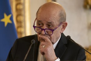 French Foreign Affairs Minister Jean-Yves Le Drian attends a news conference with US Secretary of State Antony Blinken at the French Ministry of Foreign Affairs in Paris, Friday, June 25, 2021