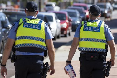 WA Police generic. 

PERTH, AUSTRALIA - FEBRUARY 01: Police are seen on patrol at a Covid-19 drive through clinic in Inglewood where members of the public have been waited over two hours in line on February 01, 2021 in Perth, Australia. Lockdown restrictions are now in place across the Perth, Peel and South West regions of Western Australia following the discovery of a positive community COVID-19 case in a worker from a quarantine hotel facility. As of 6pm on Sunday, people Perth, Peel and the South West are subject to stay at home orders, and will only be allowed to leave their homes to shop for essentials, for medical or health needs, exercise within their neighbourhood or travel to work if they cannot work from home. Face masks are now mandatory outdoors, with all restrictions to remain in place until 6pm on February 5. (Photo by Matt Jelonek/Getty Images)