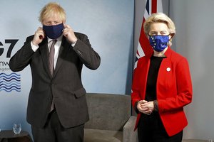 Britain's Prime Minister Boris Johnson meets with European Commission President Ursula von der Leyen during the G7 summit in Cornwall, England, Saturday June 12, 2021