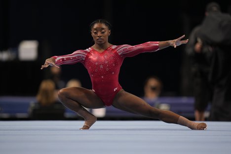 Simone Biles competes in the floor exercise during the women's U.S. Olympic Gymnastics Trials Sunday, June 27, 2021, in St. Louis.