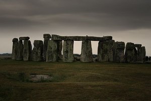 File - Stonehenge is a prehistoric monument on Salisbury Plain in Wiltshire, England. It consists of an outer ring of vertical sarsen standing stones, each around 13 feet (4.0 m) high, seven feet (2.1 m) wide, and weighing around 25 tons, topped by connecting horizontal lintel stones.