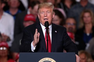 President of the United States Donald Trump speaking with supporters at a Make America Great Again campaign rally at International Air Response Hangar at Phoenix-Mesa Gateway Airport in Mesa, Arizona, 19 October 2018.