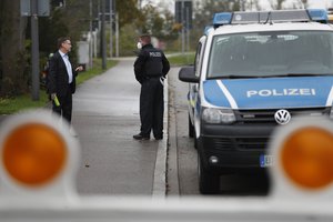 German police officers patrol in Kehl, Germany, at the German-French border Thursday, Oct. 15, 2020