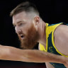 Australia’s Aron Baynes (right) vies with Italy’s Marco Spissu for the ball.