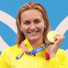 Ariarne Titmus poses with the gold medal for the women’s 200m freestyle Final on day five of the Tokyo 2020 Olympic Games.