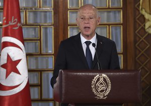 Tunisian President Kais Saied gives a speech at the new government's swearing-in ceremony at the Carthage Palace outside the capital Tunis, Thursday Feb. 27, 2020