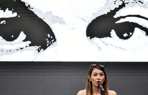 Anna Donath of Momentum party speaks during a protest against the government's alleged use of powerful Pegasus spyware to spy on opponents, Budapest, Hungary, July 26, 2021.