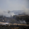 Fields burn after a rocket was fired from Lebanon into Israeli territory.