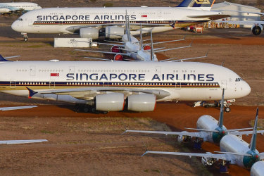 ALICE SPRINGS, AUSTRALIA - MAY 15: Grounded aeroplanes which include Airbus A380s, Boeing MAX 8s and other smaller aircrafts are seen at the Asia Pacific Aircraft Storage facility on May 15, 2020 in Alice Springs, Australia. The number of passenger planes housed at the Asia Pacific Aircraft Storage facility has increased due to the Coronavirus (COVID-19) pandemic with at least four Airbus A380 planes grounded there, the first time the aircraft has landed at Alice Springs. (Photo by Steve Strike/Getty Images) Getty image for Traveller. Single use only.