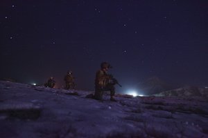 Afghan soldiers provide perimeter security during a tactical training exercise in Kabul province Feb. 7, 2013