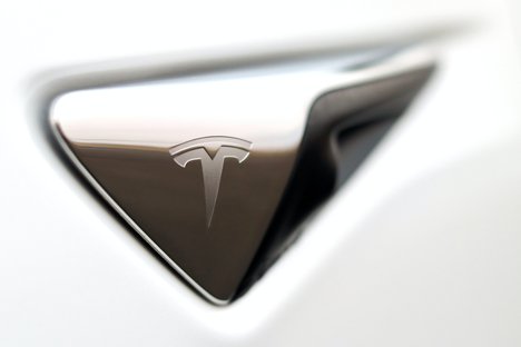 Tesla logo on white background