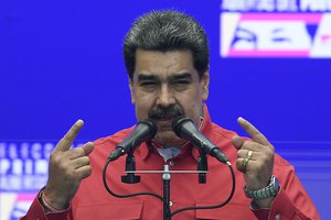 Venezuela's President Nicolas Maduro speaks during a press conference after he voted in the ruling party's primary elections of United Socialist Party of Venezuela, at the Escuela Ecológica Bolivariana Simón Rodríguez in the Fuerte Tiuna neighborhood of Caracas, Venezuela, Sunday, Aug. 8, 2021