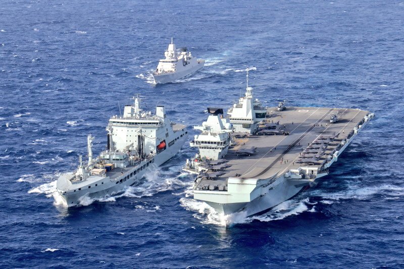 HMS Queen Elizabeth sails east into the Philippine Sea. Pictured here with RFA Tidespring and HNLMS Evertsen.