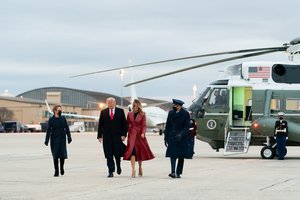 Donald J. Trump and First Lady Melania Trump are escorted from Marine One to Air Force One by U.S. Air Force Col. Stephen Snelson and his wife Catherine Snelson at Joint Base Andrews, Md. Saturday, Dec. 5, 2020, to begin their trip to Georgia