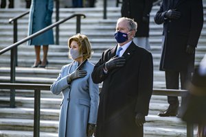 Former President George W. Bush and former First Lady Laura Bush render honors during a Presidential Armed Forces Full Honors Wreath-Laying Ceremony at the Tomb of the Unknown Soldier at Arlington National Cemetery, January 20, 2020