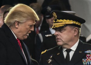 Donald Trump shakes hands with Gen. Mark Milley, chief of staff of the Army during the 58th Presidential Inauguration Parade in Washington, D.C.