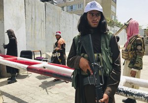 Taliban fighters stand guard in Kabul, Afghanistan, Tuesday, Aug. 17, 2021