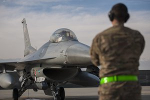 First Lt. Matthew Sanders, 421st Expeditionary Fighter Squadron pilot, prepares to depart for a combat sortie in an F-16 Fighting Falcon at Bagram Air Field, Afghanistan