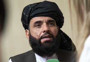 In this photo taken on Tuesday, May 28, 2019, Suhail Shaheen, spokesman for the Taliban's political office in Doha, speaks to the media in Moscow, Russia