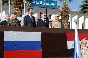 Vladimir Putin during a visit by Russian President Vladimir Putin to the Khmeimim airbase in Syria