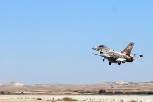 Pilot practice landing and take-off techniques of F-16 fighter jet at Nevitim Airbase, Israel