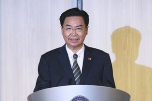 In this file photo taken Monday, March 29, 2021, Taiwanese Foreign Minister Joseph Wu speaks at a news conference with Palau President Surangel Whipps in Taipei, Taiwan