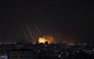 Smoke rises following Israeli missile strikes on Gaza City, Thursday, May 13, 2021