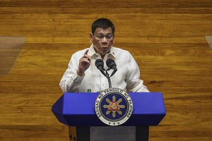 File - Philippine President Rodrigo Duterte delivers his final State of the Nation Address at the House of Representatives in Quezon city, Philippines on Monday, July 26, 2021. Duterte delivered his final state of the nation speech Monday before Congress, winding down his six-year term amid a raging pandemic, a battered economy and a legacy overshadowed by a bloody anti-drug crackdown