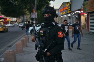 Security forces are deployed in Baghdad, Iraq, Friday, Aug. 27, 2021. Iraqi special forces were deployed on the streets of the Iraqi capital a day ahead of a regional summit to be held in Baghdad, aimed at easing Mideast tensions and boosting Iraq's nascent role as a regional mediator.