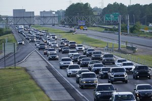 Heavy traffic clogs Interstate 10 out of New Orleans as residents and visitors evacuate for the expected arrival of Hurricane Ida Saturday, Aug. 28, 2021, in Slidell, La.