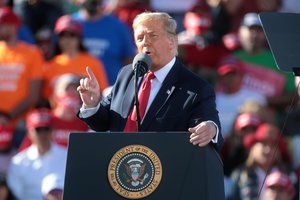 Donald Trump speaking with supporters at a "Make America Great Again" campaign rally at Phoenix Goodyear Airport in Goodyear, Arizona