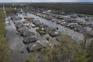 Homes are flooded in the aftermath of Hurricane Ida in LaPlace, La., Tuesday, Aug. 31, 2021