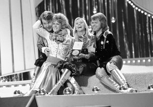 File - Swedish pop group ABBA celebrate winning the 1974 Eurovision Song Contest on stage at the Brighton Dome in England on April 6, 1974, with their song Waterloo. L-R: Benny Andersson, Anni-Frid Lyngstad (Frida), Agnetha Faltskog, and Bjorn Ulvaeus.