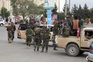 Taliban fighters arrive outside the Hamid Karzai International Airport after the U.S. military's withdrawal, in Kabul, Afghanistan, Tuesday, Aug. 31, 2021