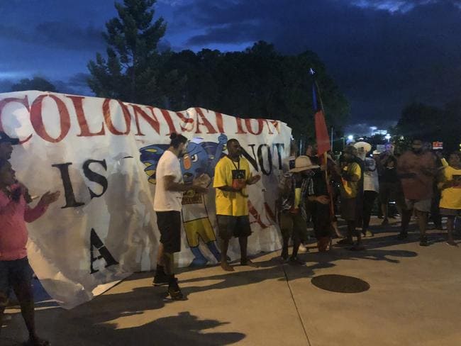 Indigenous activists displayed signs reading ‘Stolenwealth Games’ and ‘Colonisation is not a Game’ as they protested for Aboriginal rights. Picture: Britt Ramsey