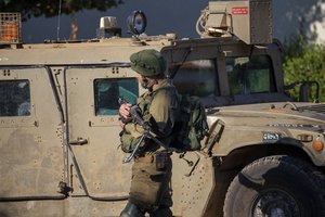 An Israeli soldier secures the village of Avivim on the Israel-Lebanon border, Monday, Sept. 2, 2019.