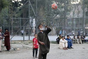 Afghans play volleyball in Kabul, Afghanistan, Monday, Aug. 30, 2021